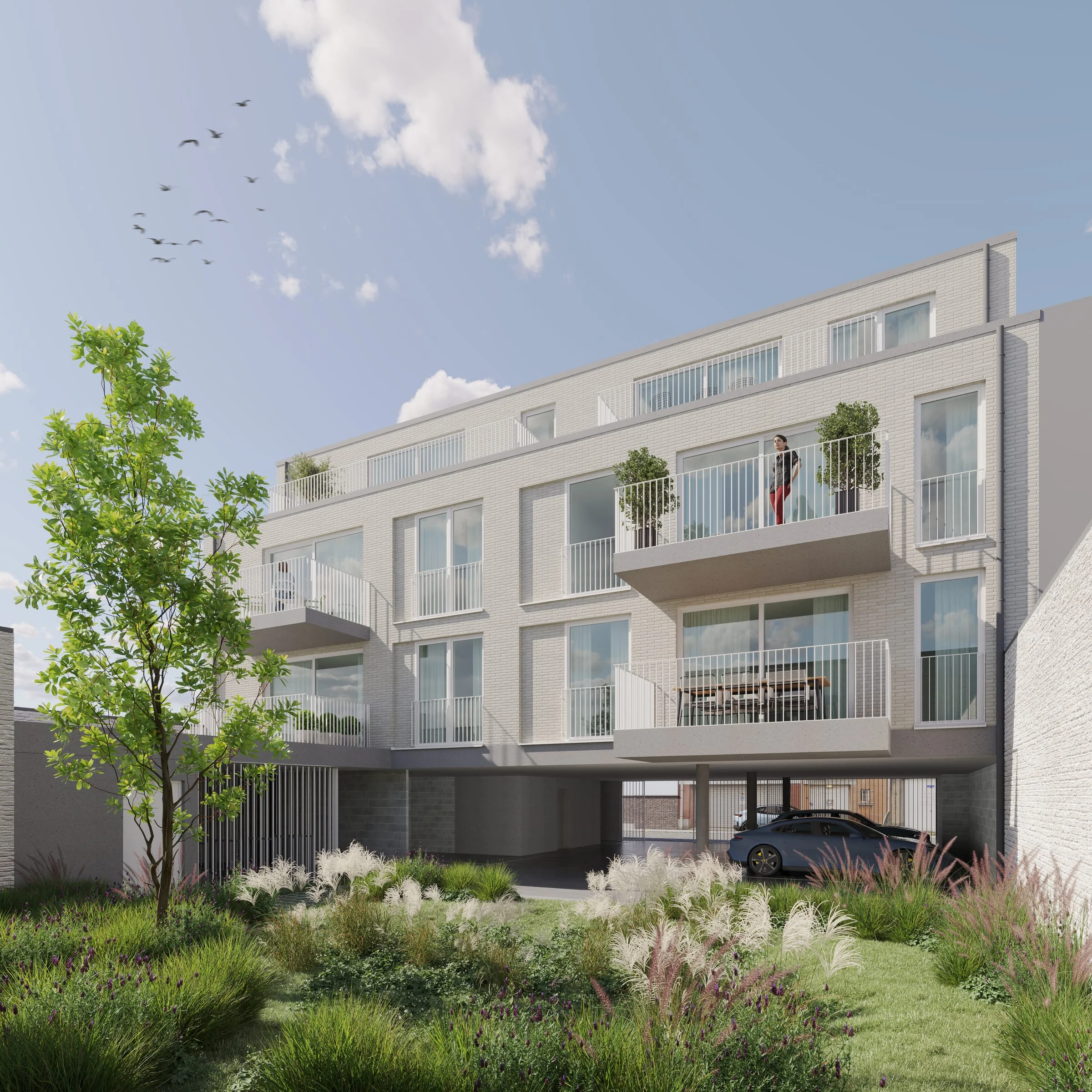 Achtergevel van Stadshof met terrassen en de gemeenschappelijke tuin