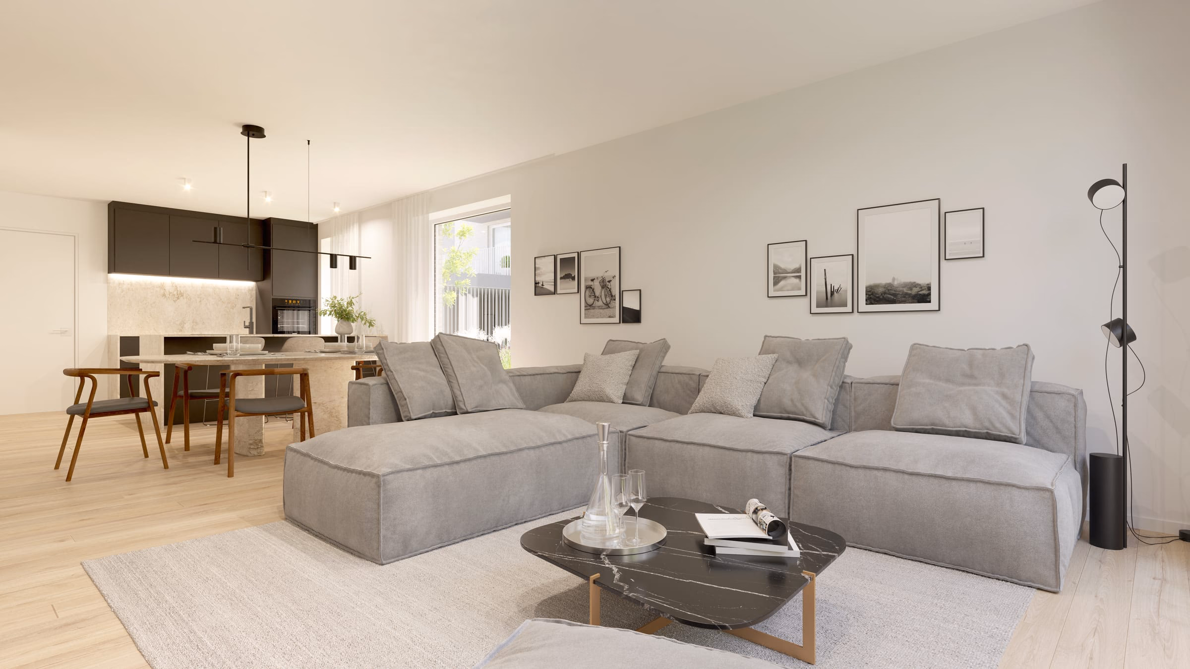 Leefruimte met zithoek en open keuken in een stadswoning