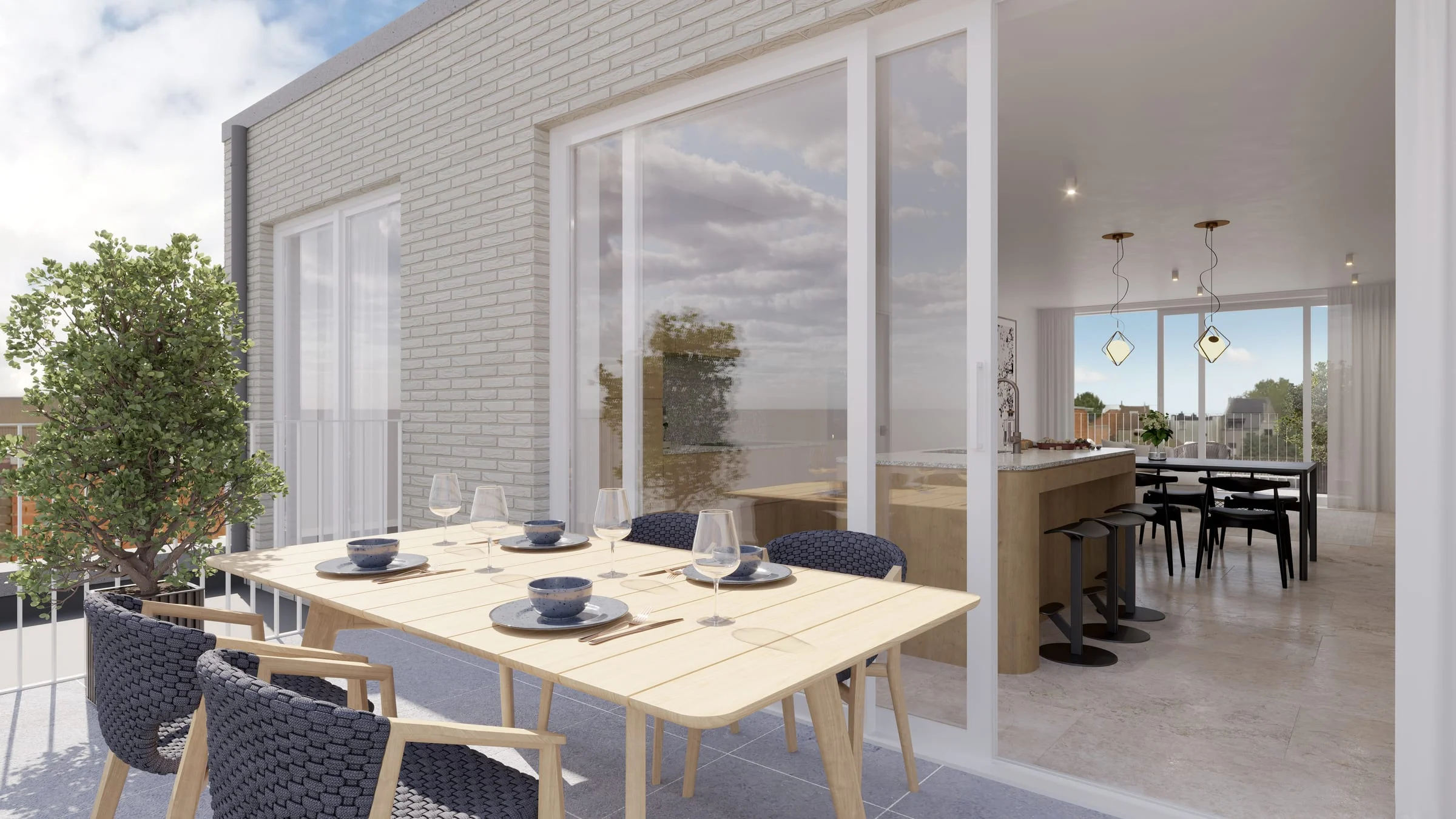 Terras met eettafel aan de leefruimte van een appartement van Stadshof